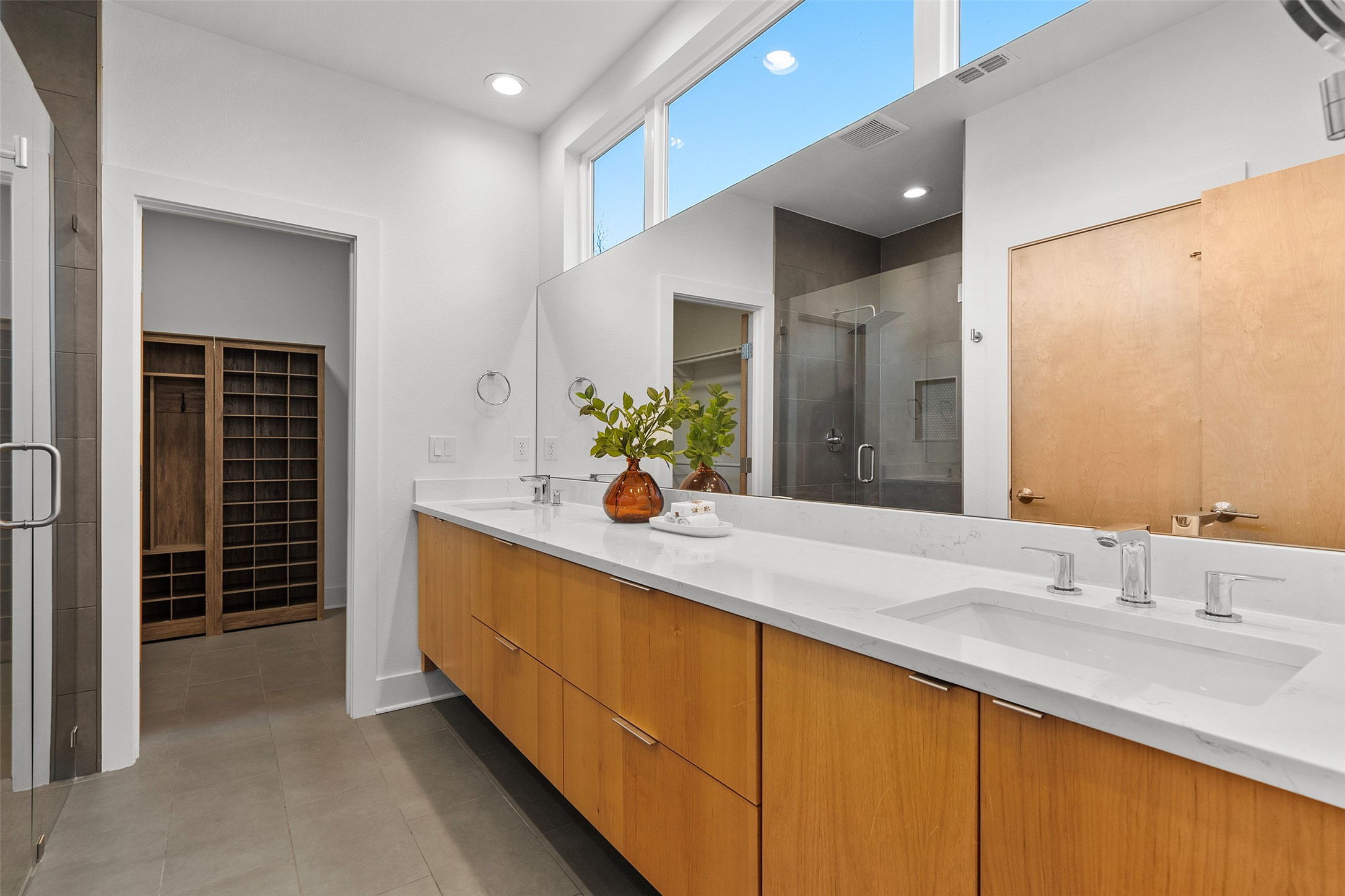 7813 Mullen Drive, Unit B Austin, TX 78757 - Photo 20 of 36 a bathroom with a sink and a mirror
