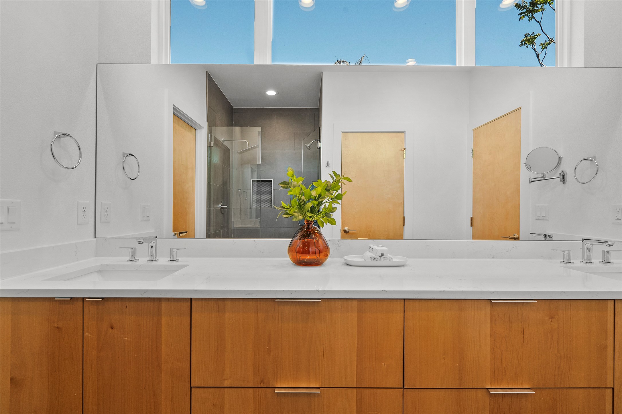 7813 Mullen Drive, Unit B Austin, TX 78757 - Photo 22 of 36 a bathroom with a sink and a mirror