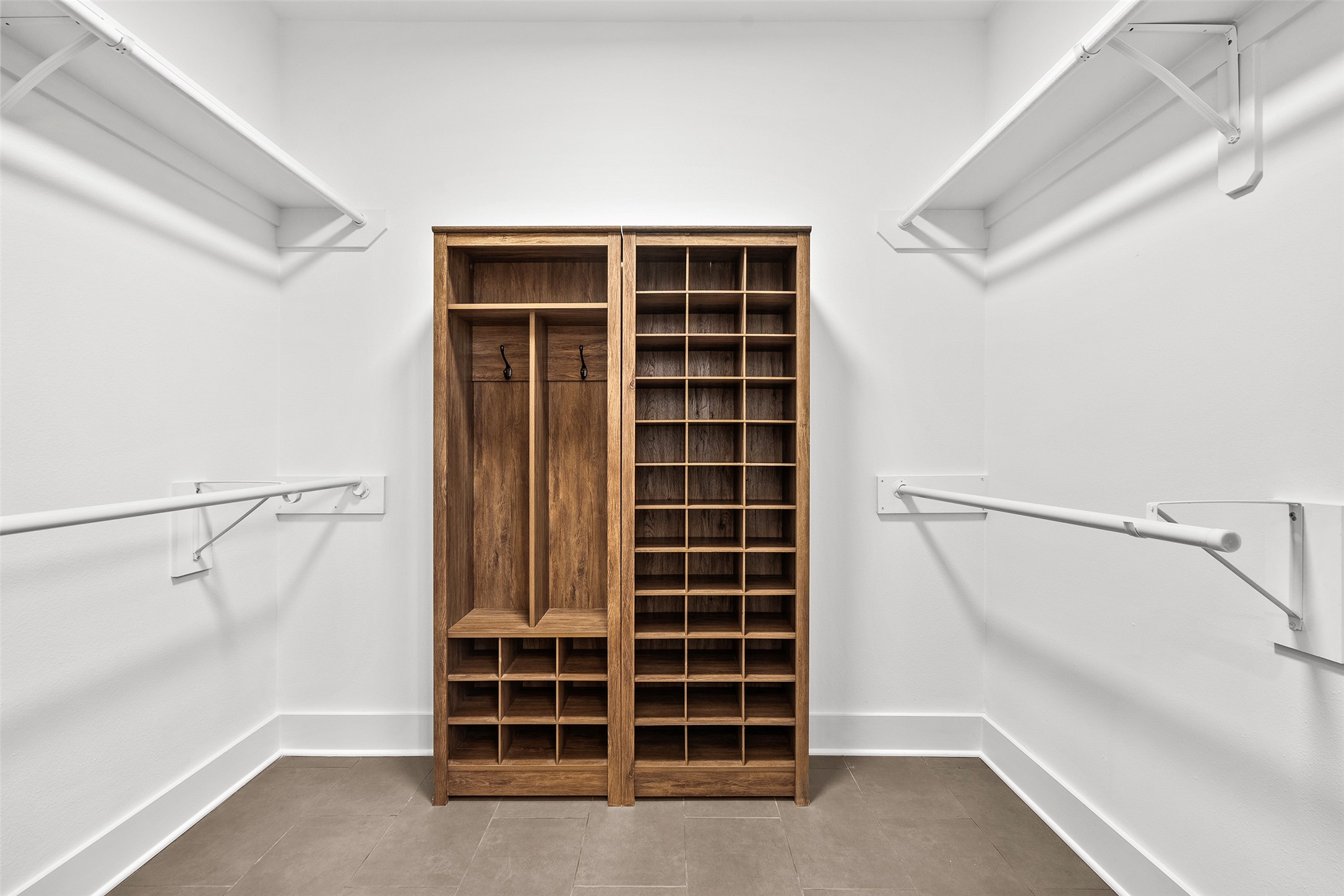 7813 Mullen Drive, Unit B Austin, TX 78757 - Photo 23 of 36 a view of an empty room with a empty shelves