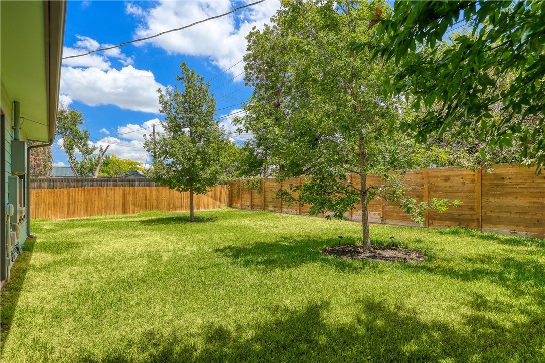 7813 Mullen Drive, Unit B Austin, TX 78757 - Photo 33 of 36 a view of yard with tree