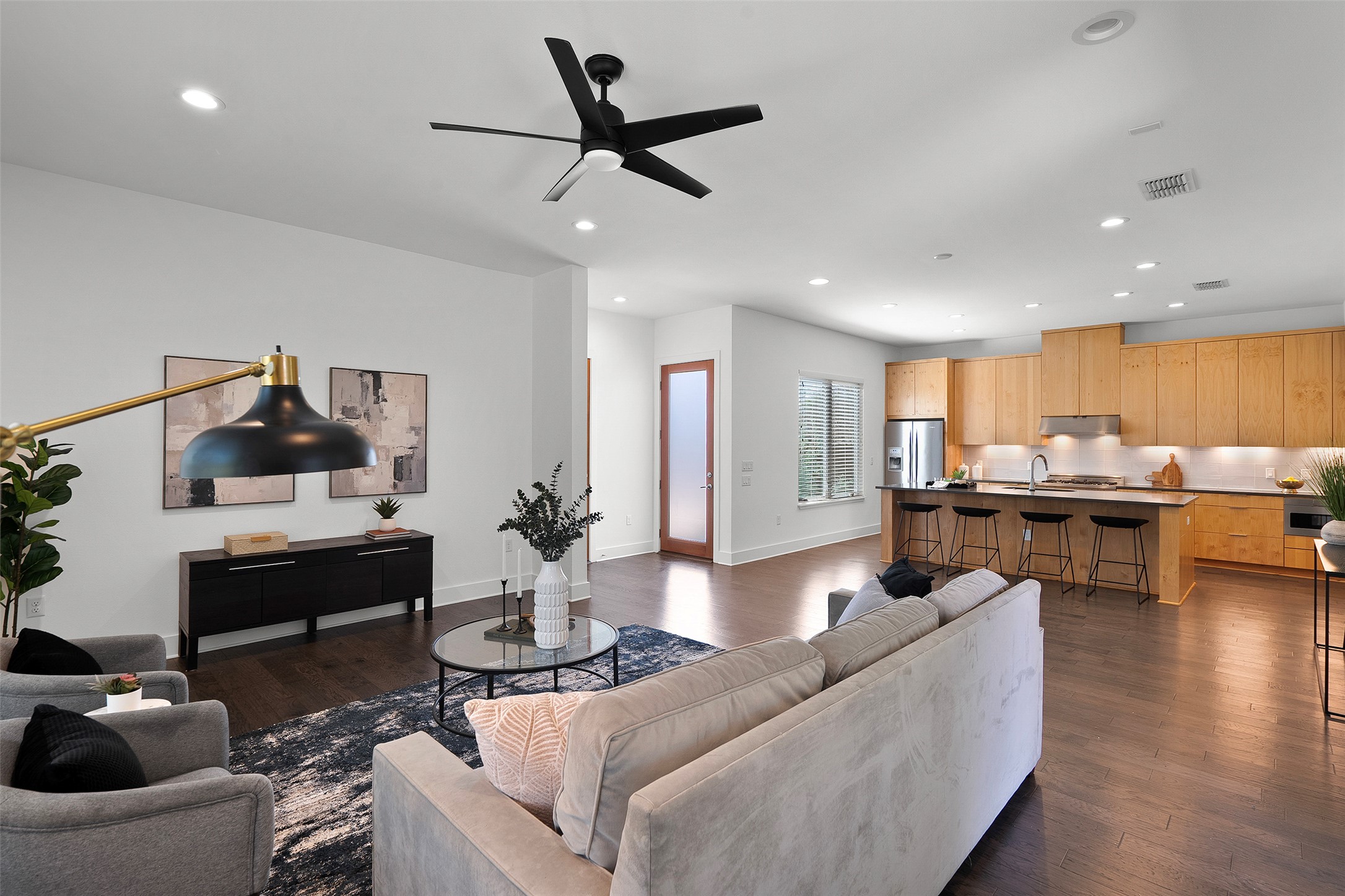 7813 Mullen Drive, Unit B Austin, TX 78757 - Photo 5 of 36 a living room with furniture and kitchen view