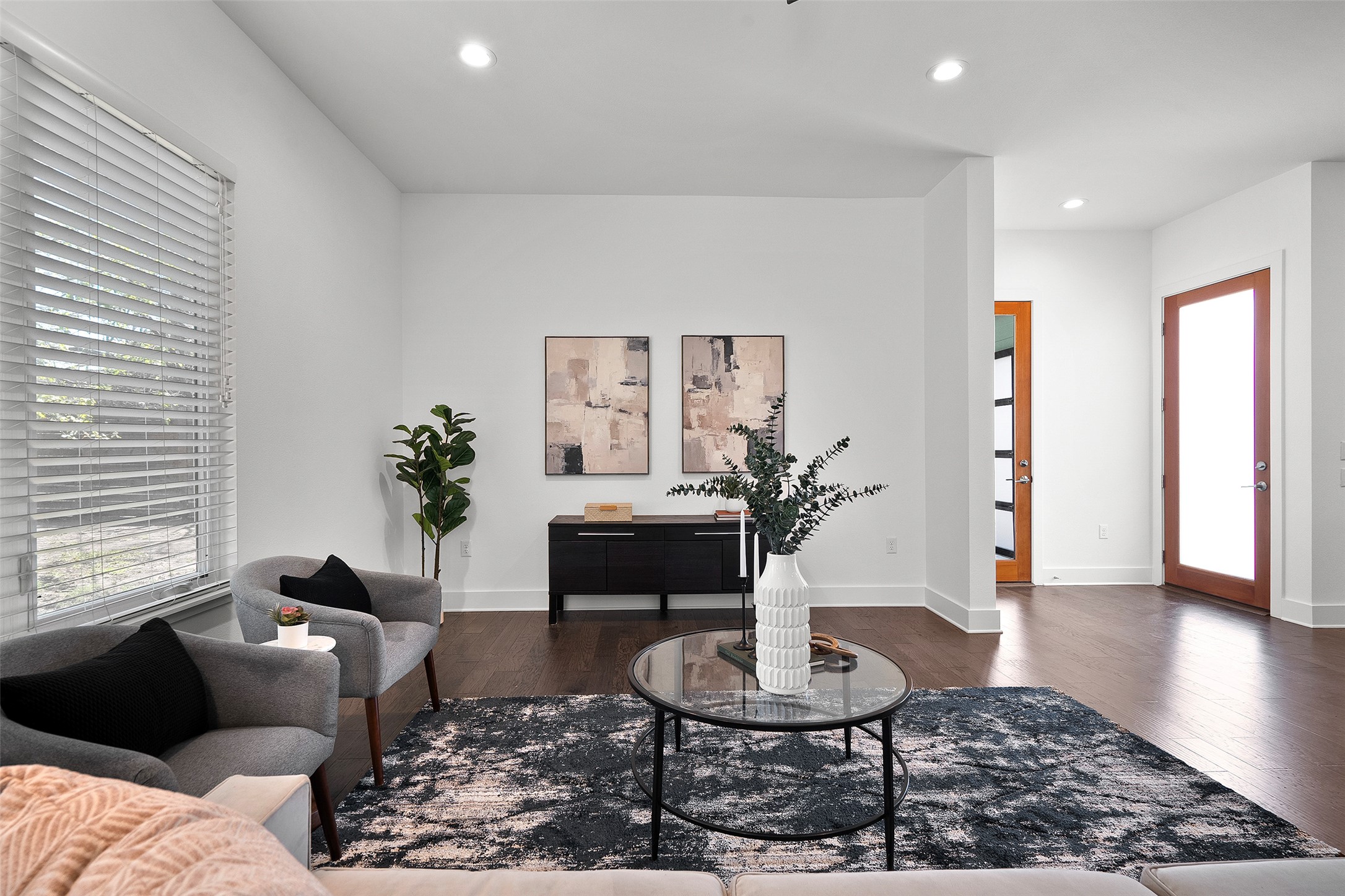 7813 Mullen Drive, Unit B Austin, TX 78757 - Photo 8 of 36 a living room with furniture and a wooden floor