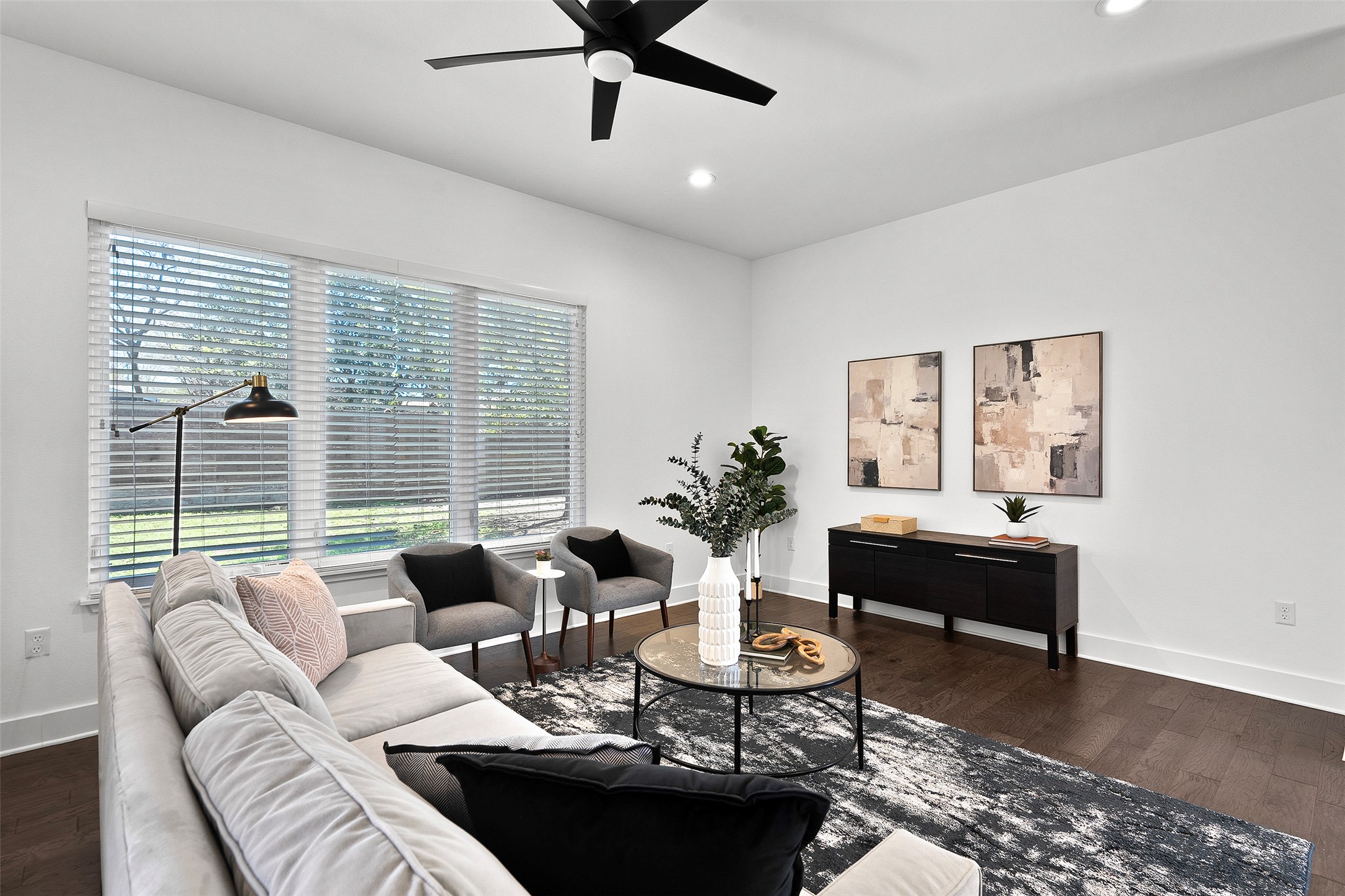7813 Mullen Drive, Unit B Austin, TX 78757 - Photo 9 of 36 a living room with furniture and a large window