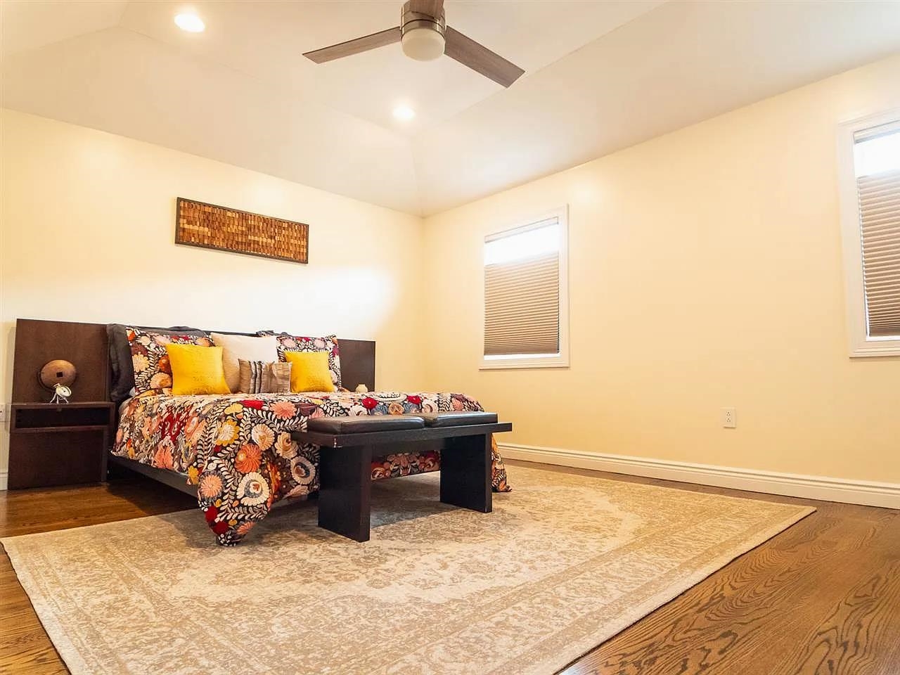 21 Jacob's Landing Way, Unit 21 Secaucus, NJ 07094 - Photo 11 of 19 a bed sitting in a bedroom next to a lamp