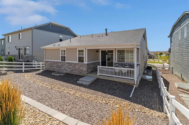 a house view with a backyard space