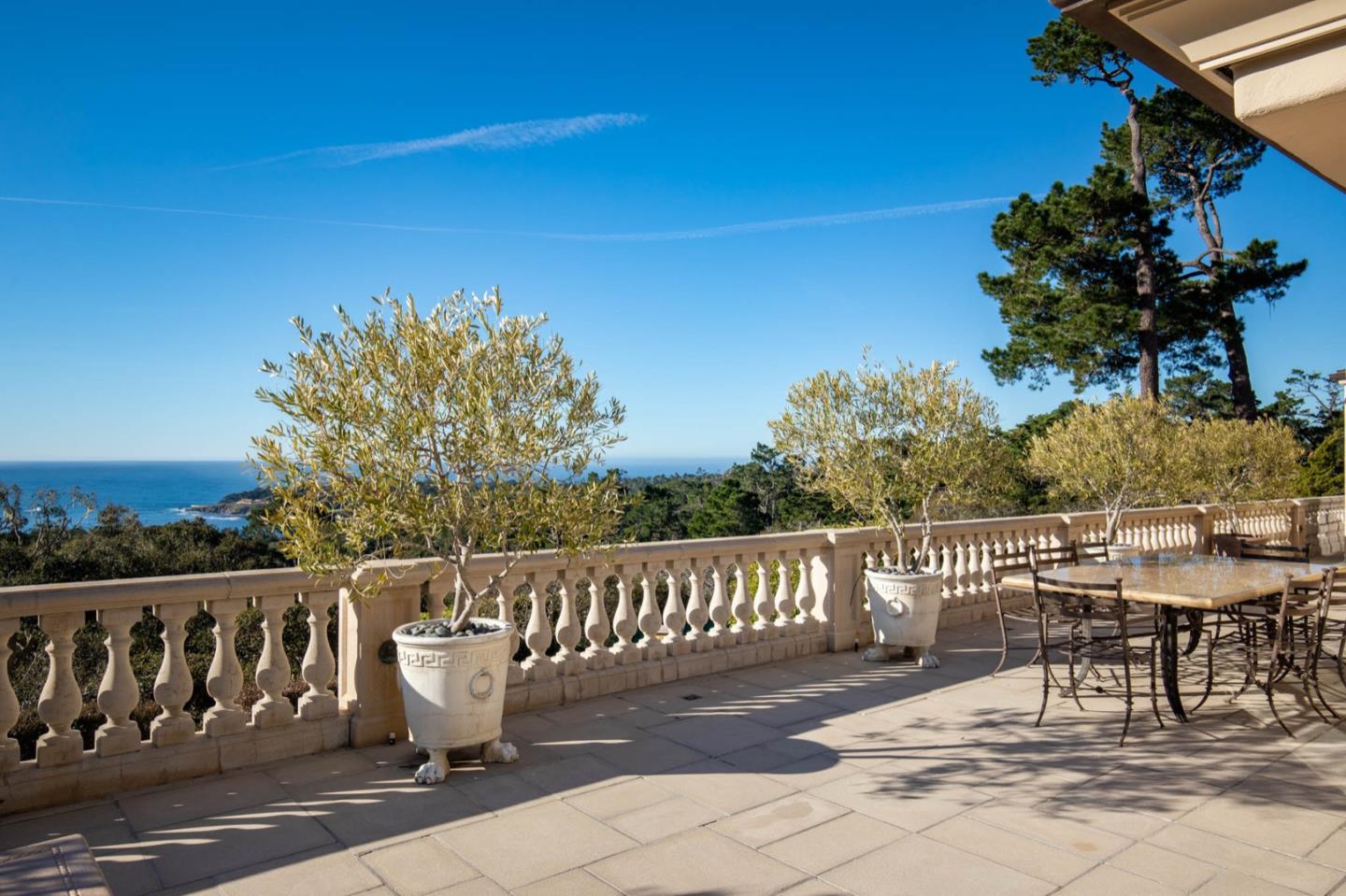 1491 Bonifacio Road Pebble Beach, CA 93953 - Photo 19 of 31 a view of a chair and table on the terrace