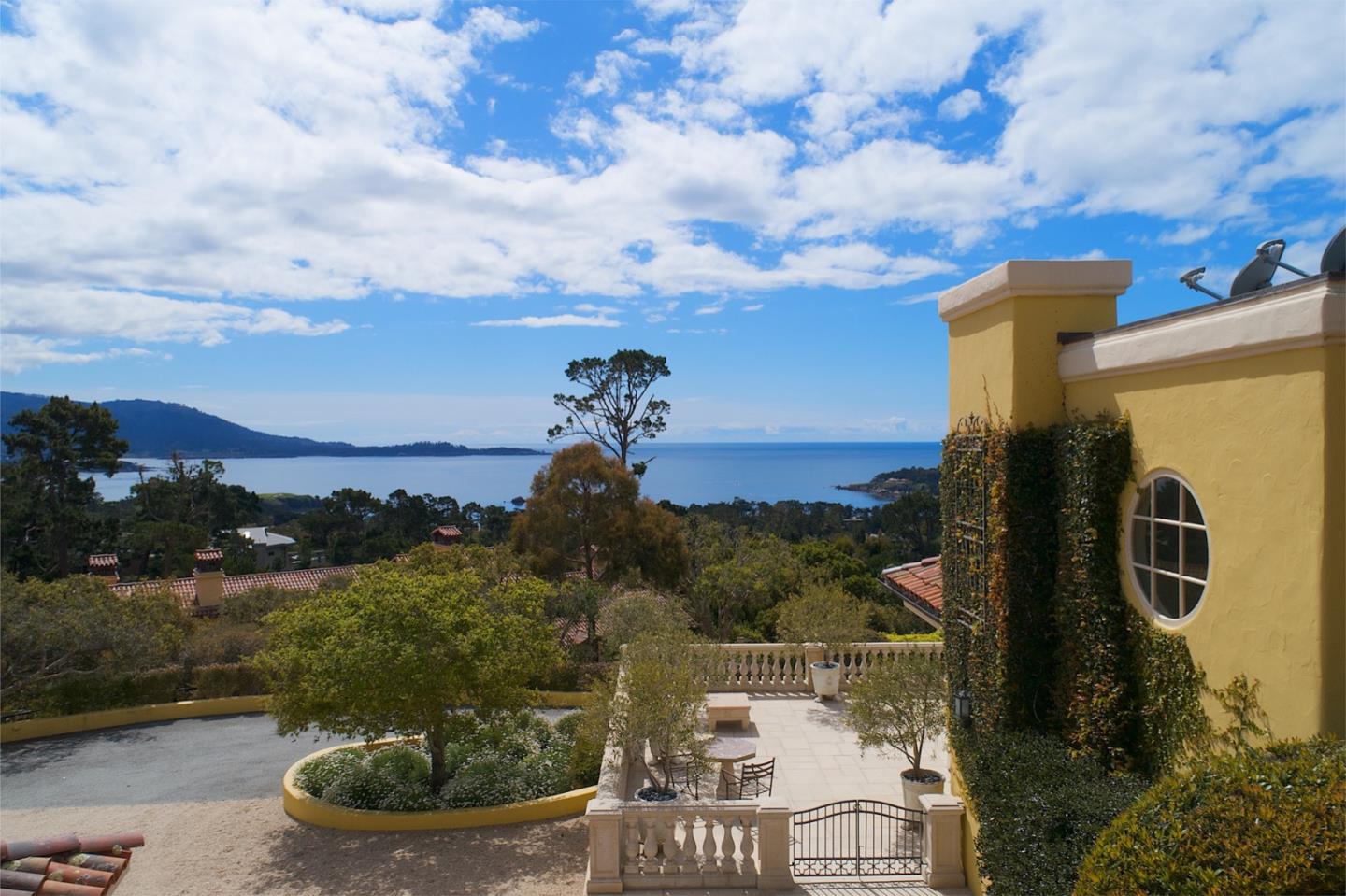 1491 Bonifacio Road Pebble Beach, CA 93953 - Photo 31 of 31 a terrace with outdoor seating and city view