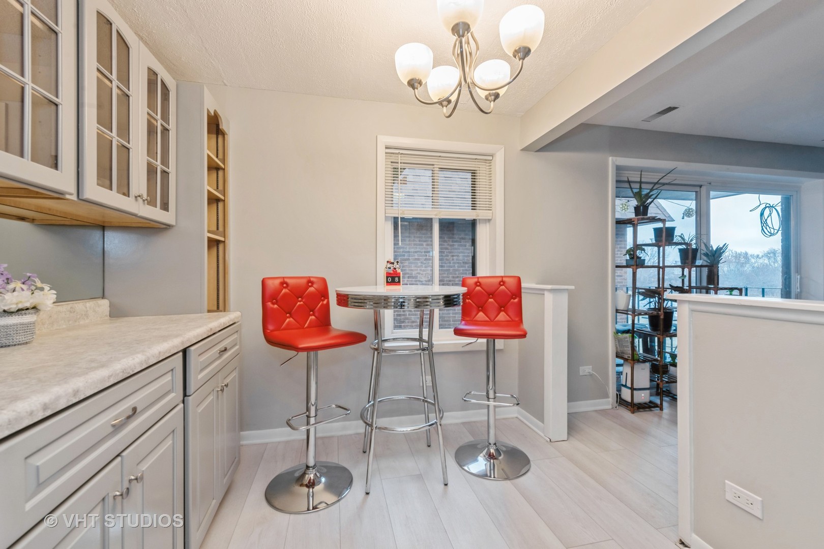 80 South Pleasant Road, Unit 304 Lake Zurich, IL 60047 - Photo 6 of 12 a view of a kitchen and dining room
