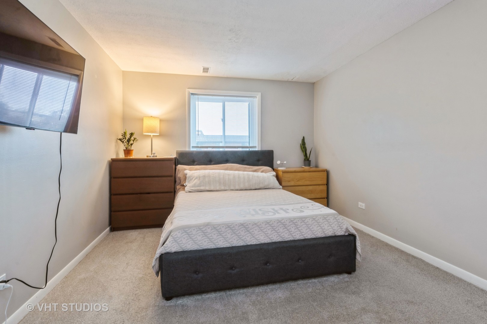 80 South Pleasant Road, Unit 304 Lake Zurich, IL 60047 - Photo 7 of 12 a bedroom with a bed and a window
