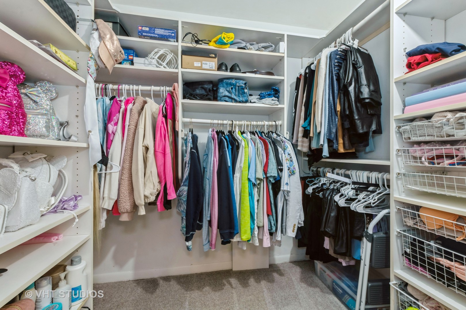 80 South Pleasant Road, Unit 304 Lake Zurich, IL 60047 - Photo 9 of 12 a view of walk in closet with clothes and shoes