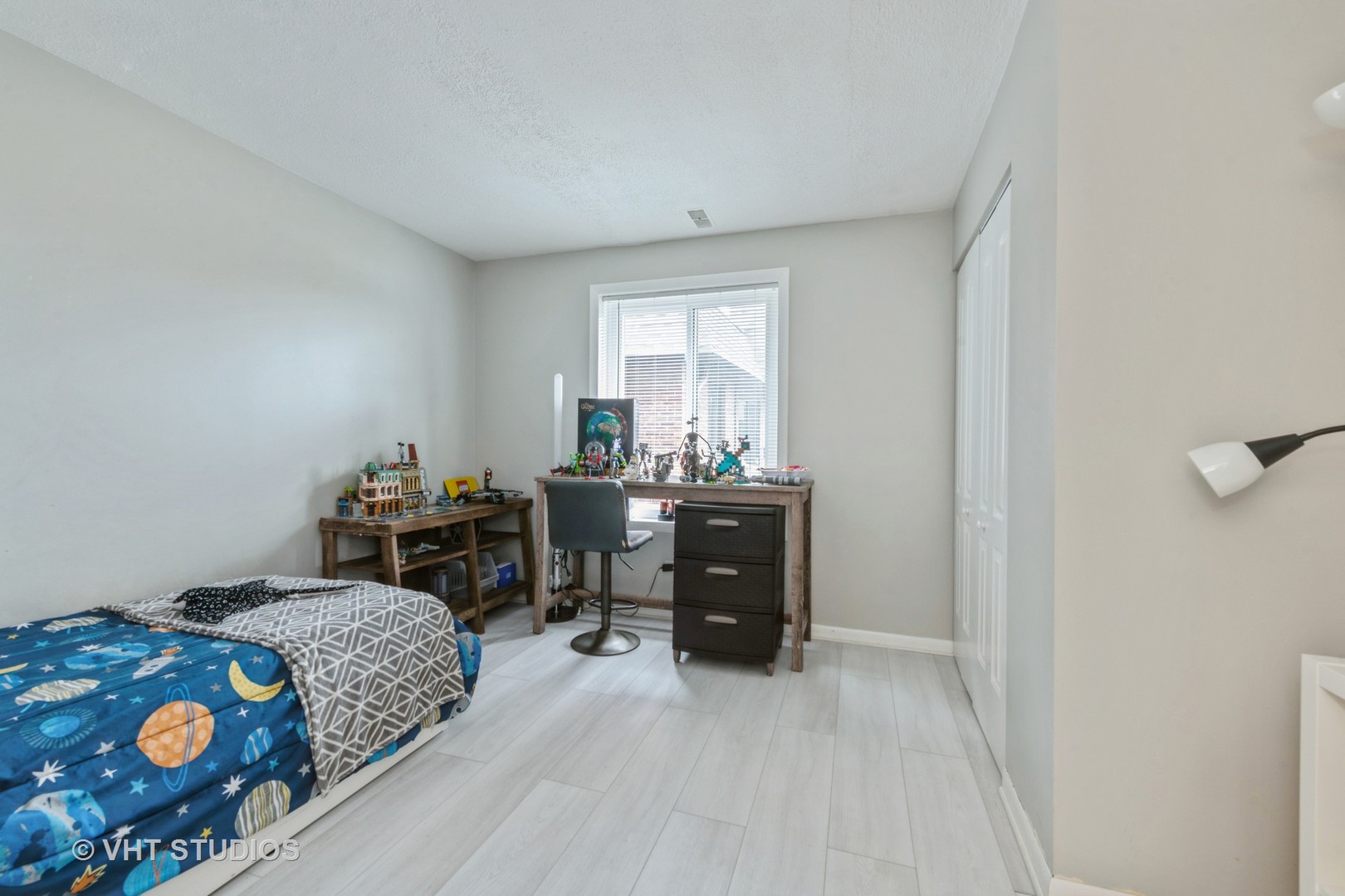 80 South Pleasant Road, Unit 304 Lake Zurich, IL 60047 - Photo 10 of 12 a bedroom with a bed and a window