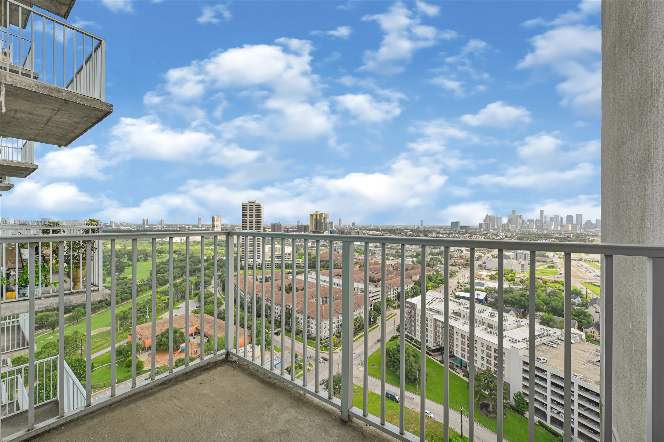 5925 Almeda Road, Unit 12403 Houston, TX 77004 - Photo 19 of 20 a view of city from a balcony