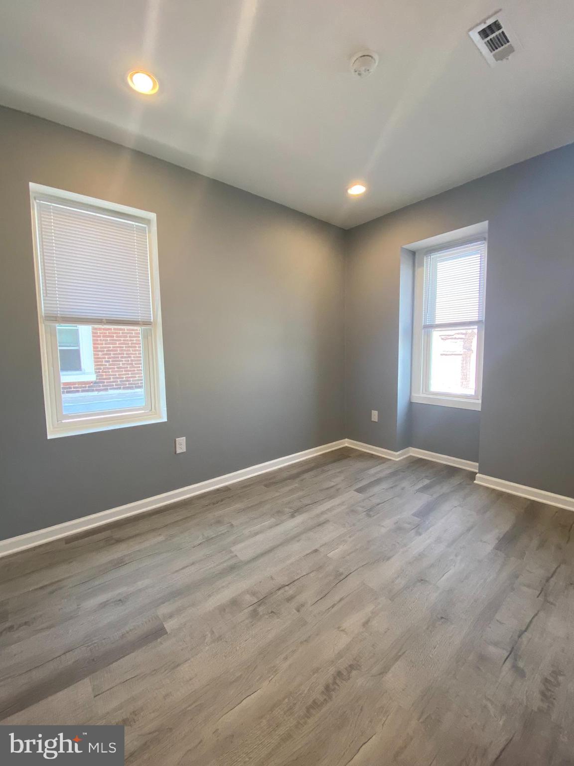 22 South 51st Street, Unit 3 Philadelphia, PA 19139 - Photo 10 of 12 a view of empty room with wooden floor