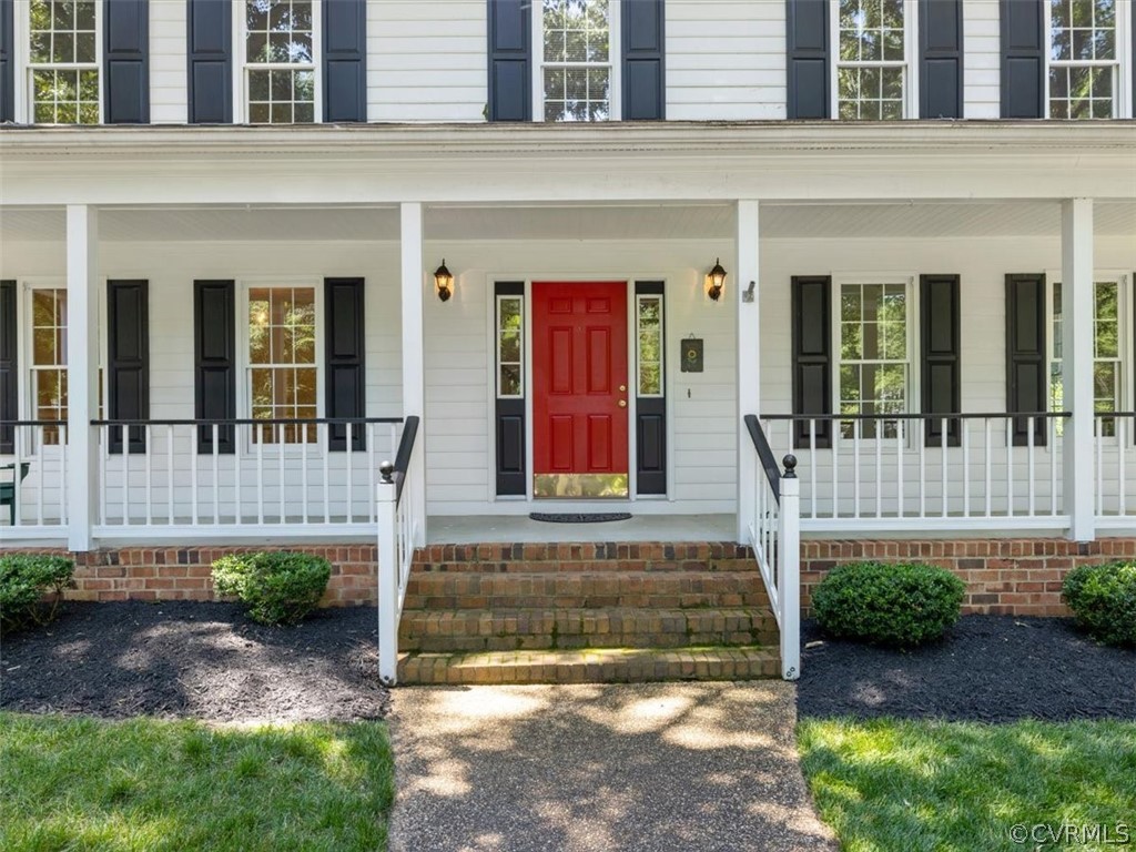 13807 Sunrise Bluff Road Midlothian, VA 23112 - Photo 3 of 40 front view of a house with a small porch