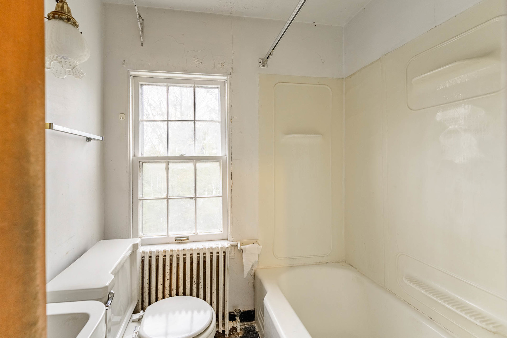207 North Main Street Lombard, IL 60148 - Photo 14 of 15 a bathroom with a tub and a window