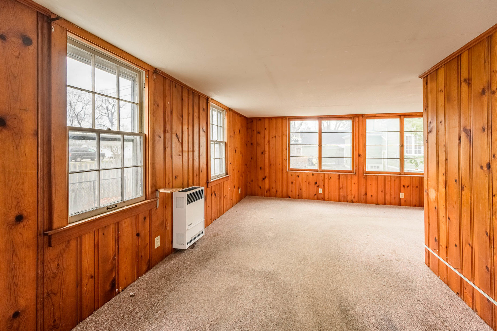 207 North Main Street Lombard, IL 60148 - Photo 8 of 15 a view of an empty room with a window