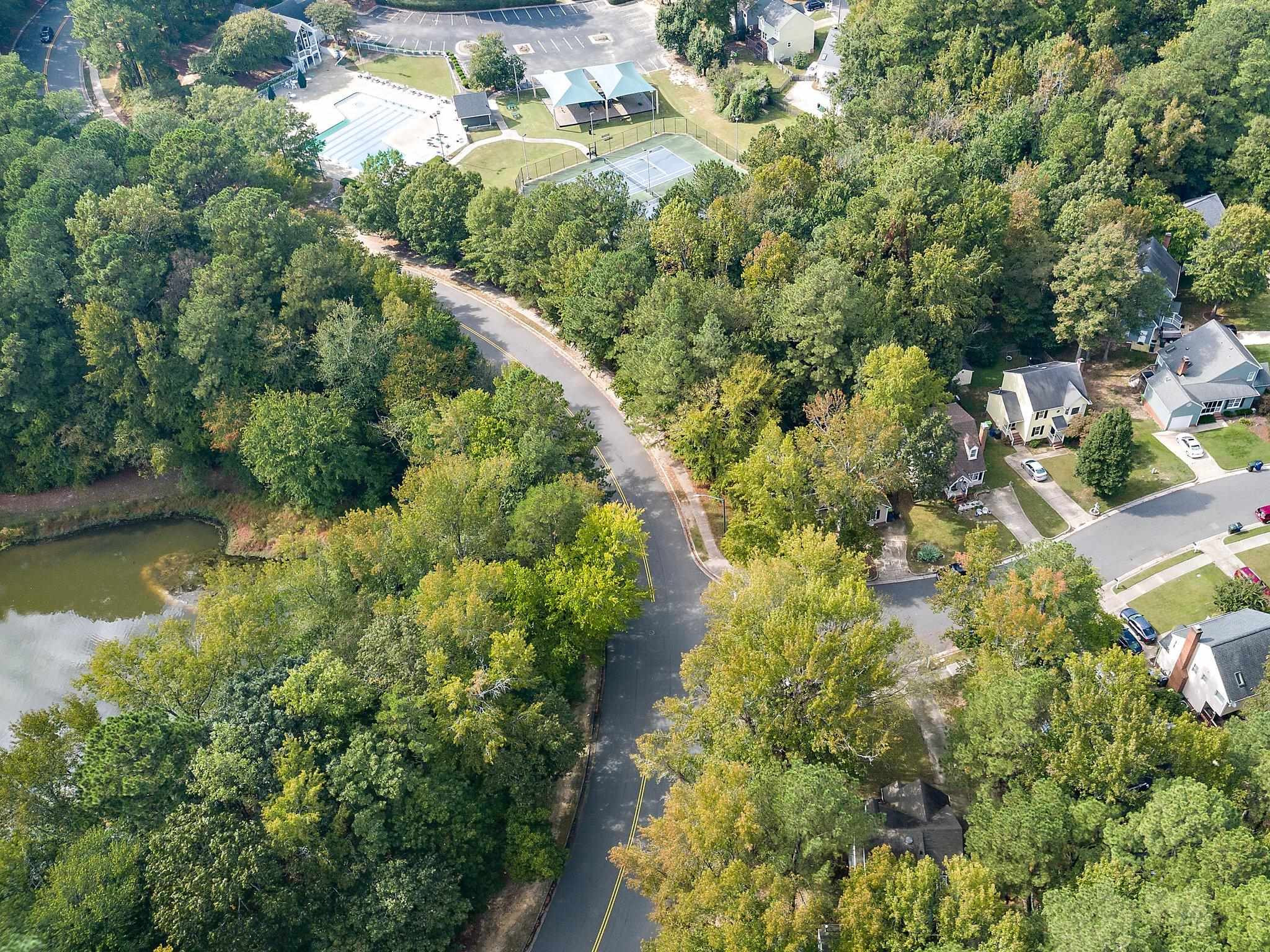 4400 Liverpool Lane Raleigh, NC 27604 - Photo 31 of 34 Aerial View of House/Pond/Pool/Tennis