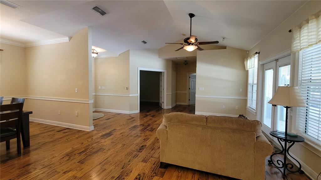 8762 Highway 26 Newberry, FL 32669 - Photo 21 of 63 a bedroom with bed and window