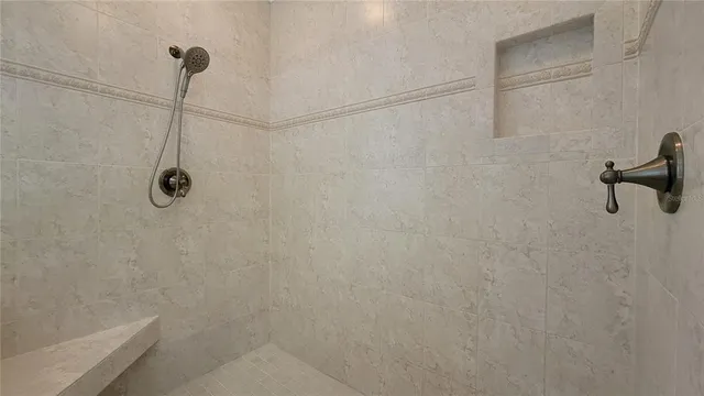 a view of a house with a yard and balcony