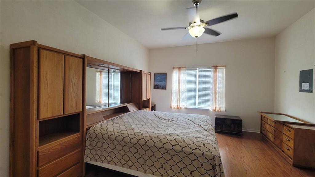 8762 Highway 26 Newberry, FL 32669 - Photo 50 of 63 a bedroom with a bed dresser and a window