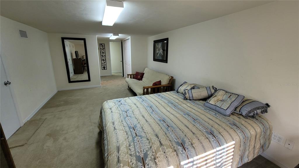 8762 Highway 26 Newberry, FL 32669 - Photo 56 of 63 a bedroom with bed and window