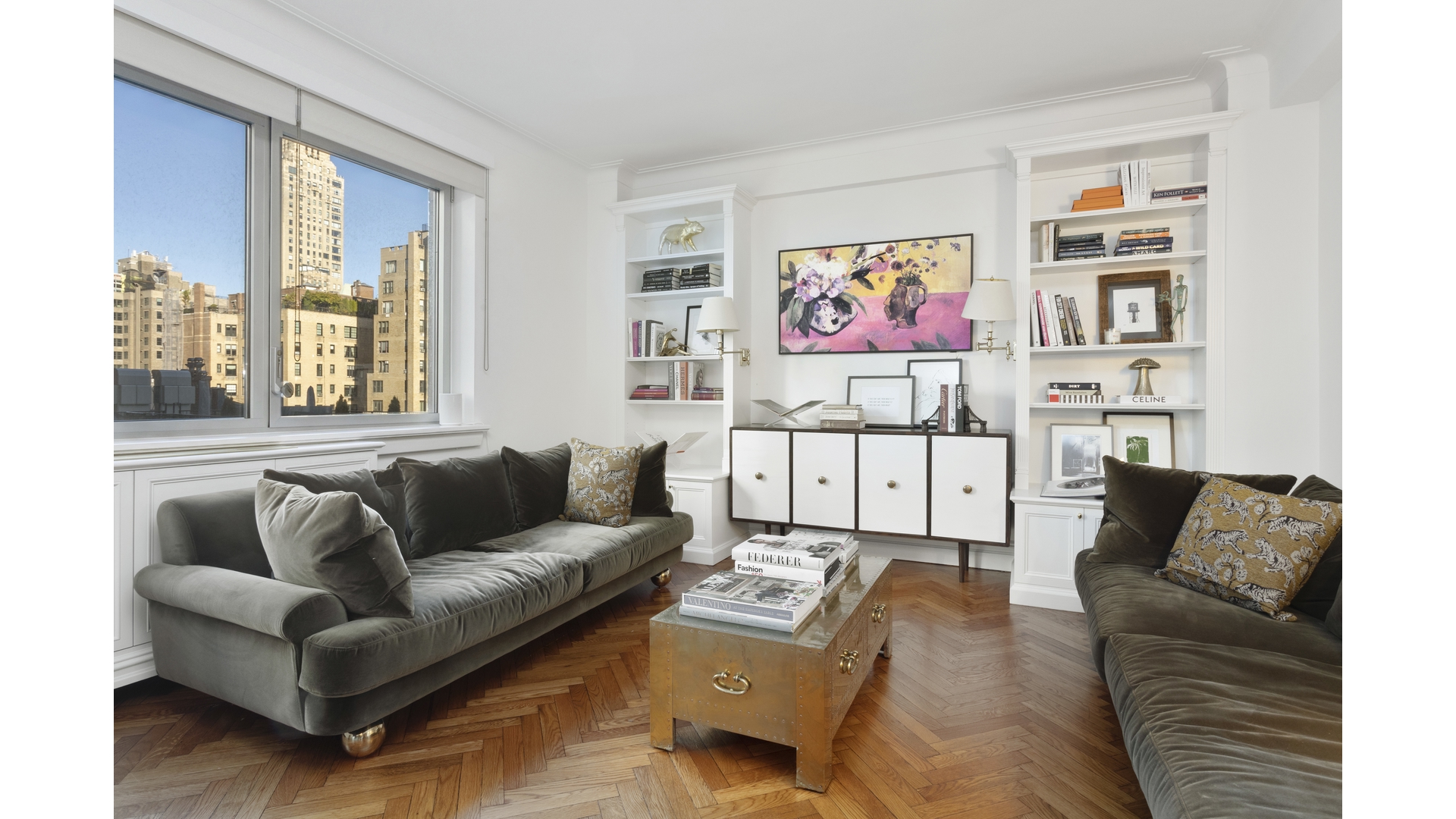 923 5th Avenue, Unit 9G Manhattan, NY 10021 - Photo 5 of 13 a living room with furniture and a large window