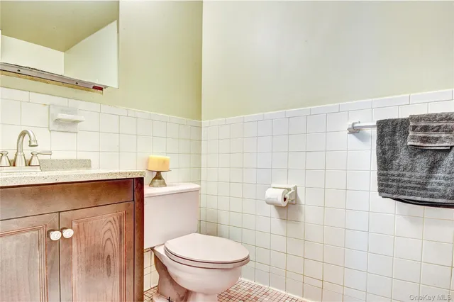 a bathroom with a toilet and a sink