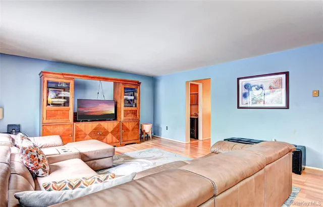 a bedroom with bed and couch