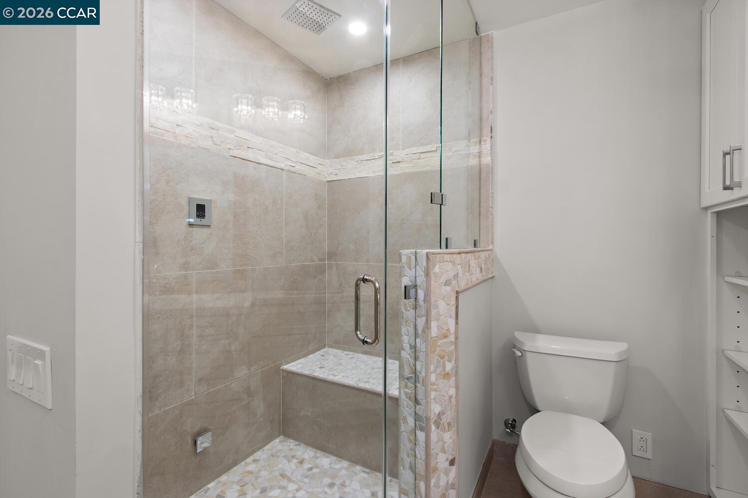 1132 Running Springs Road, Unit 11 Walnut Creek, CA 94595 - Photo 10 of 18 a bathroom with a toilet and a shower