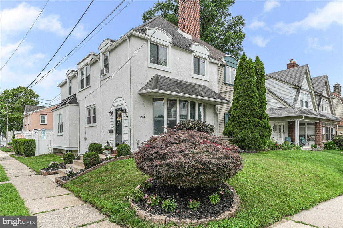 244 Sedgewood Road Springfield, PA 19064 - Photo 1 of 31 a view of a white house next to a yard