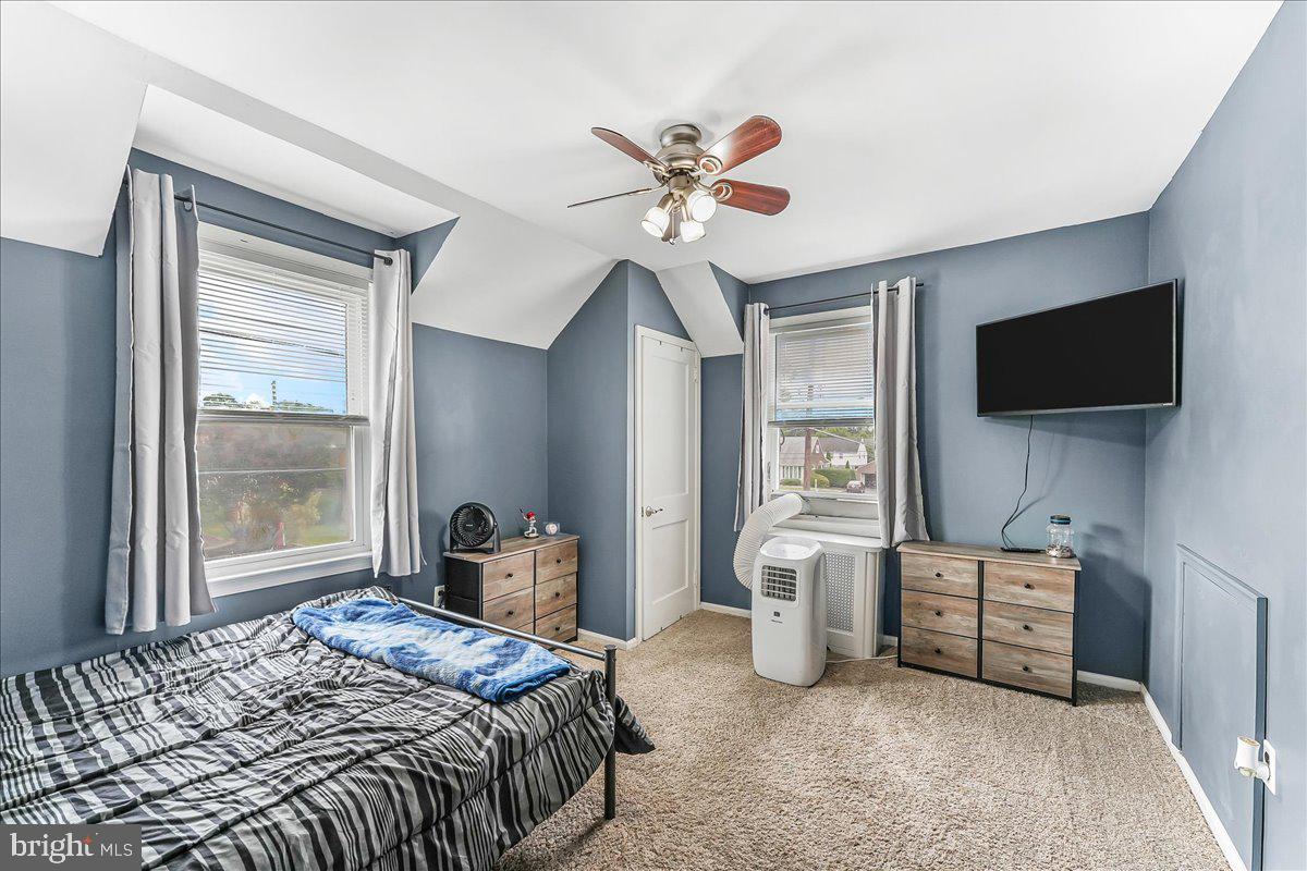 244 Sedgewood Road Springfield, PA 19064 - Photo 21 of 31 a bedroom with a bed and a flat tv screen on dresser