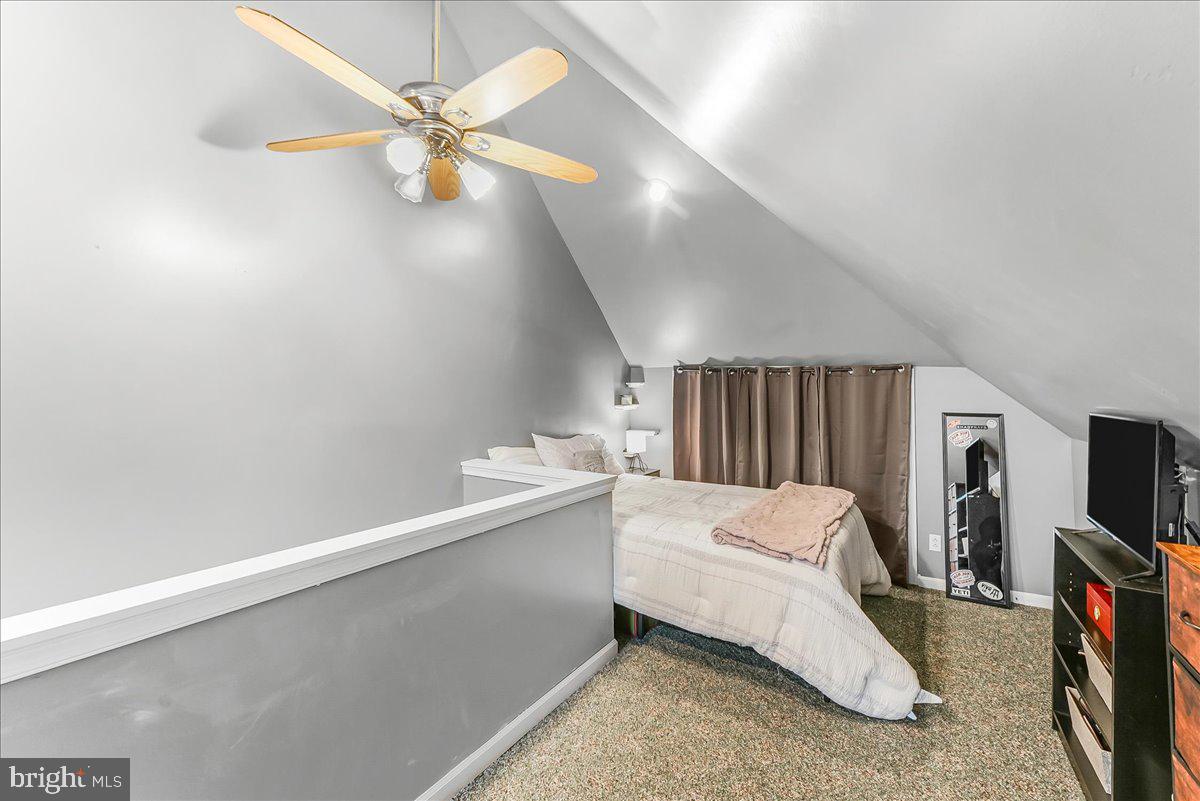 244 Sedgewood Road Springfield, PA 19064 - Photo 23 of 31 a bedroom with a bed and a ceiling fan