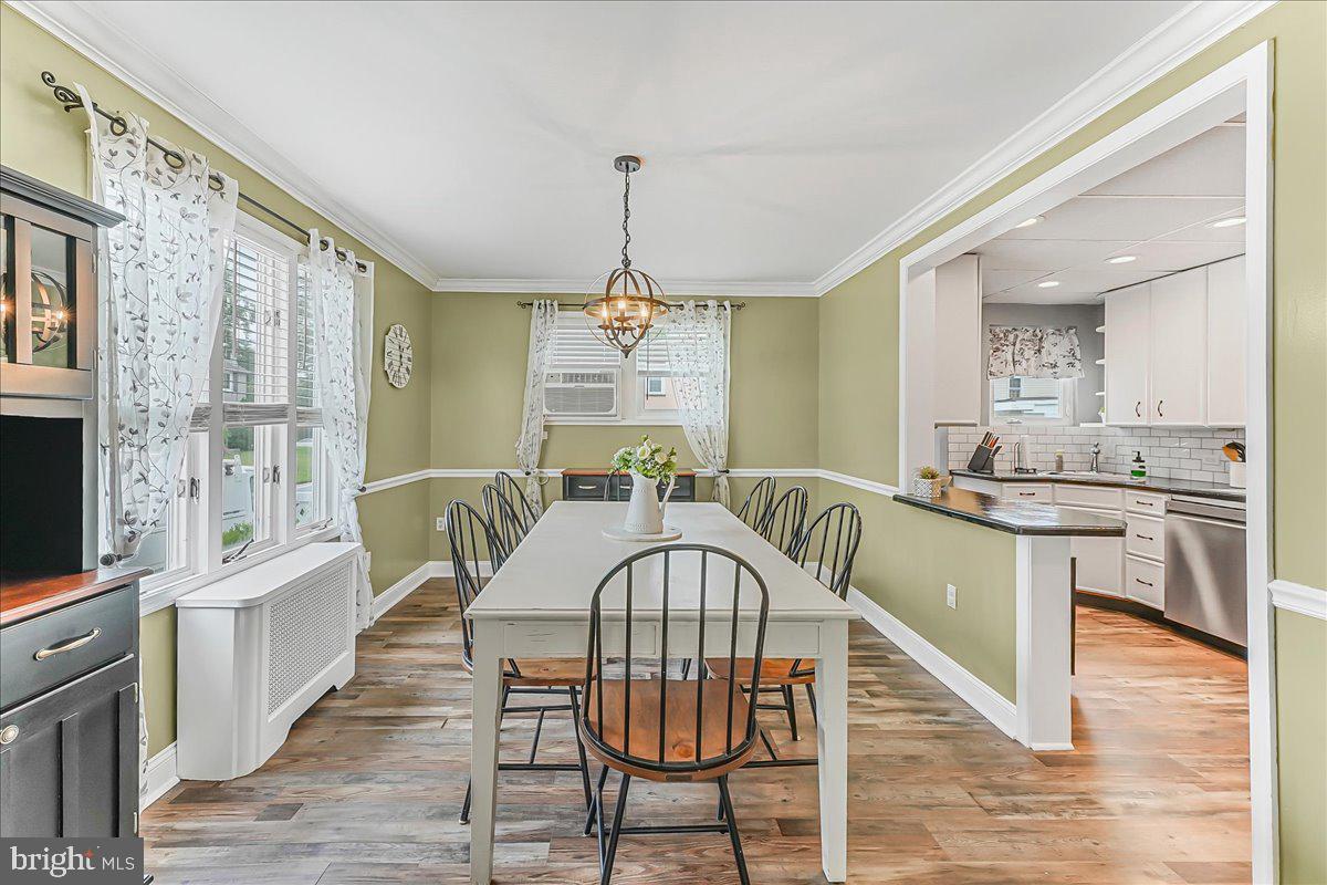 244 Sedgewood Road Springfield, PA 19064 - Photo 10 of 31 a view of a dining room with furniture window and wooden floor