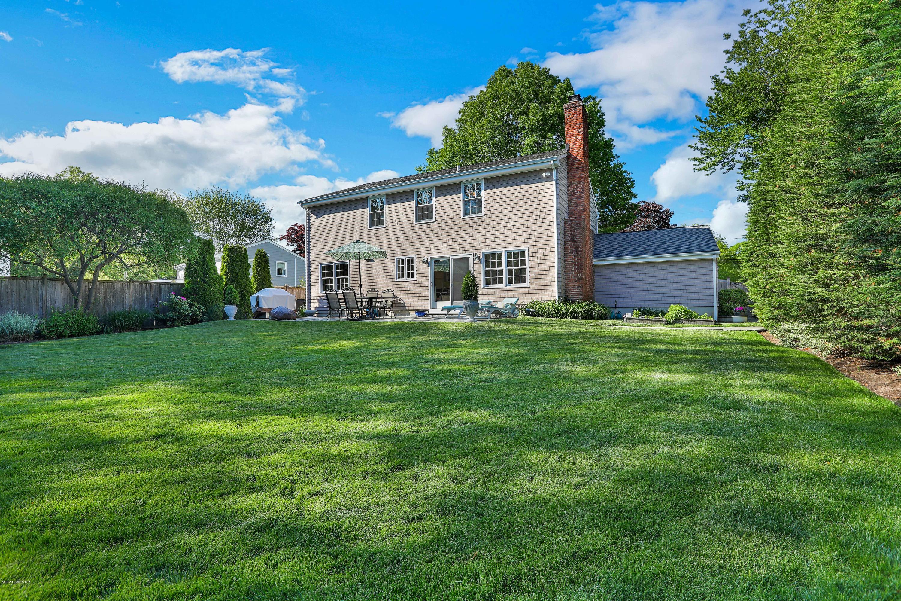 38 Split Timber Place Riverside, CT 06878 - Photo 20 of 24 a view of a house with a yard