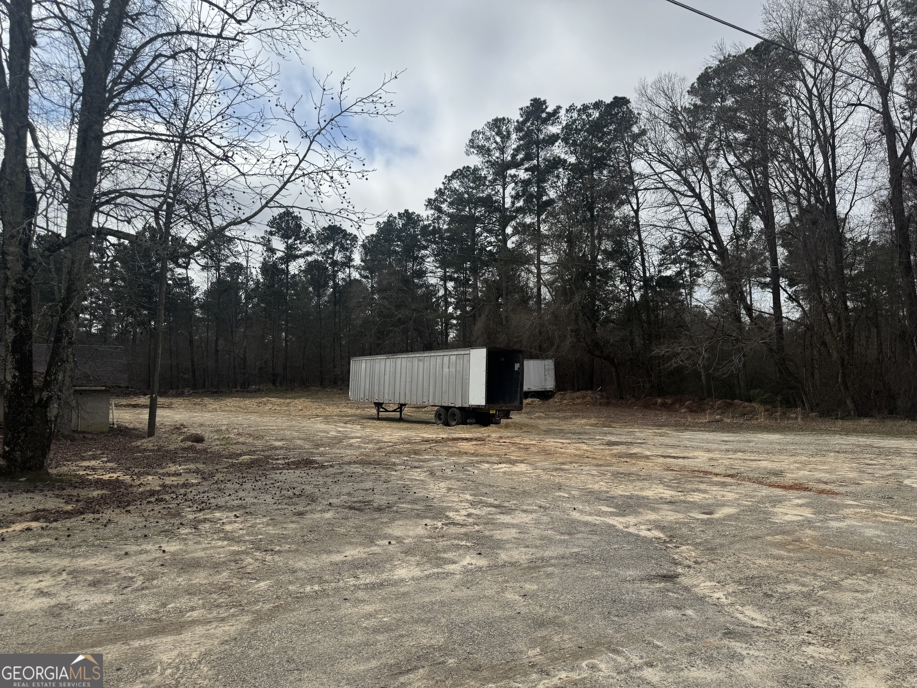 184 Mill Road McDonough, GA 30253 - Photo 11 of 40 a house with trees in front of it