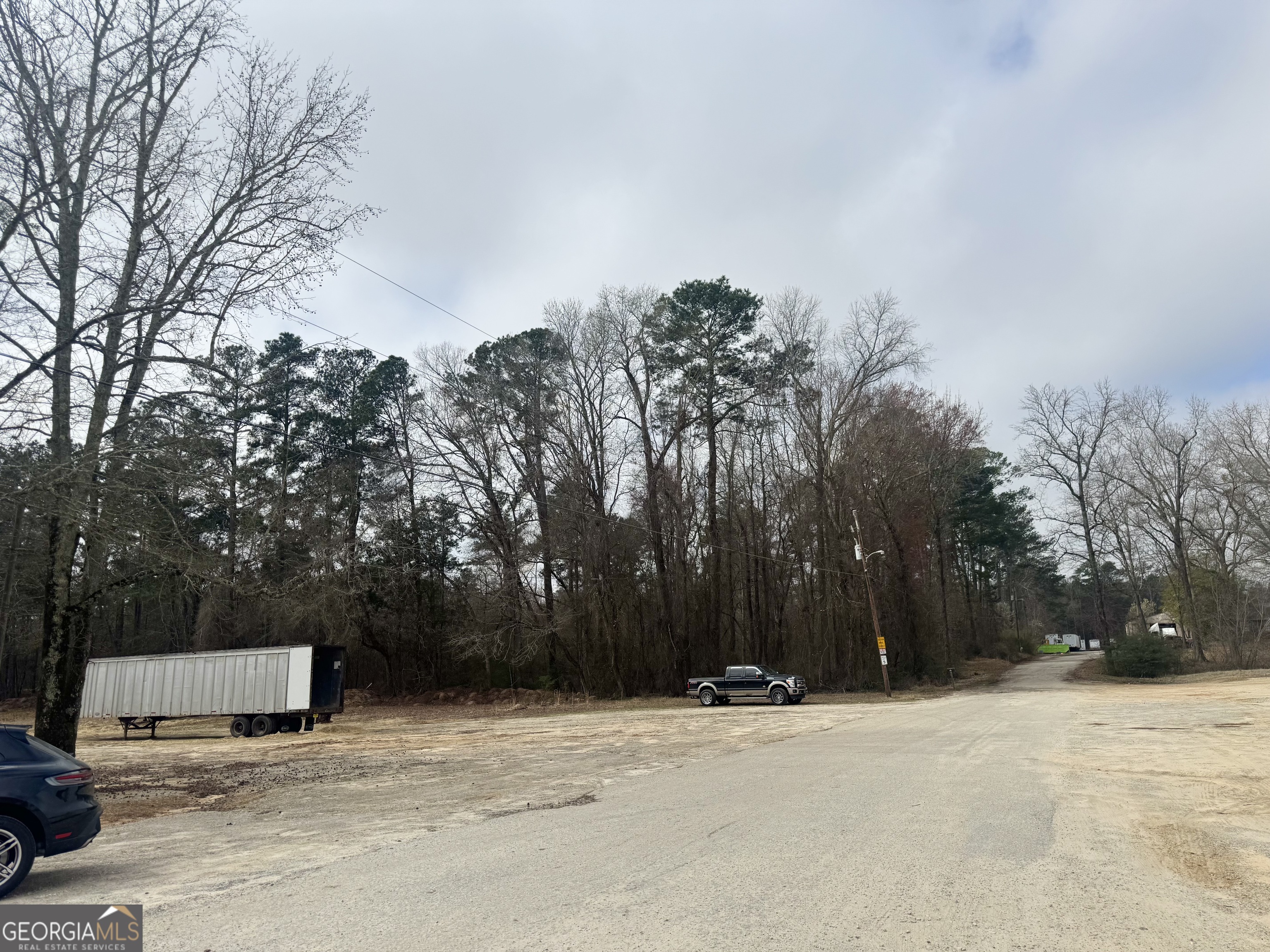 184 Mill Road McDonough, GA 30253 - Photo 2 of 40 a street view of house with trees