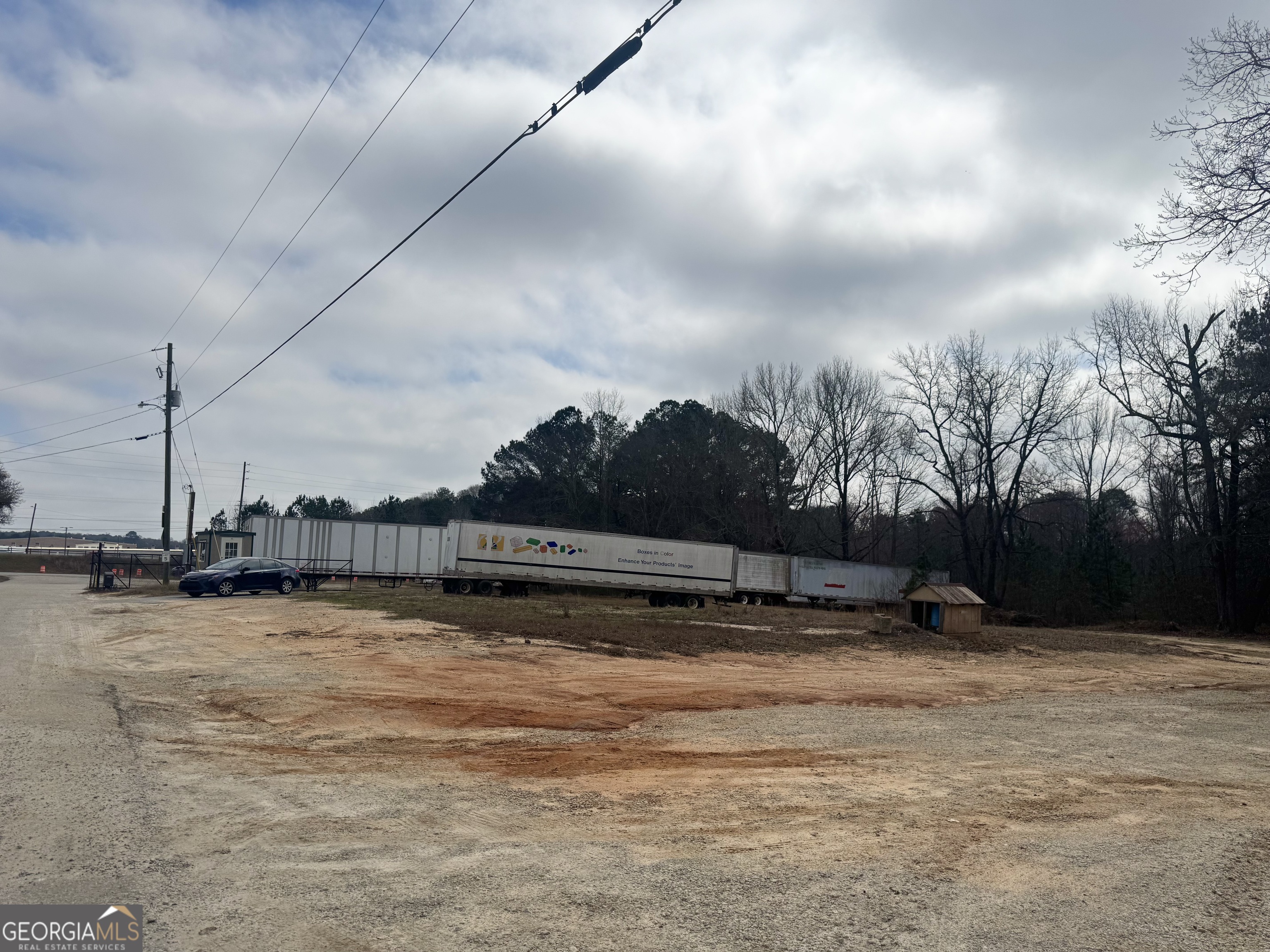 184 Mill Road McDonough, GA 30253 - Photo 10 of 40 a view of swimming pool with trees in the background