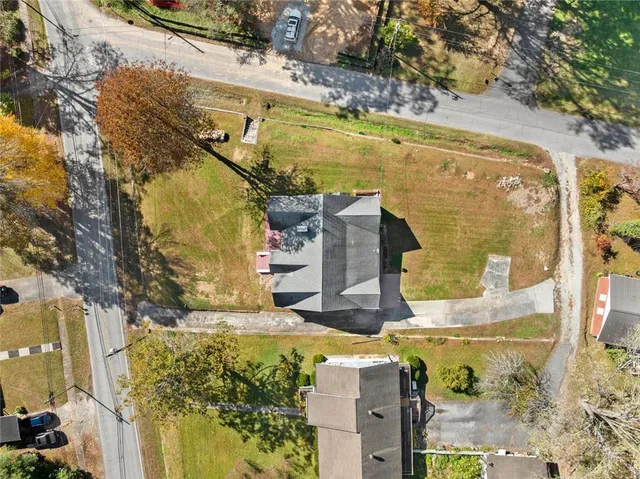 an aerial view of residential house with outdoor space