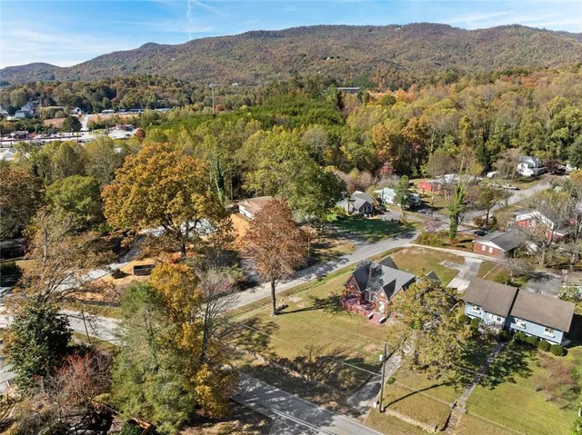 a view of a city with mountains in the background