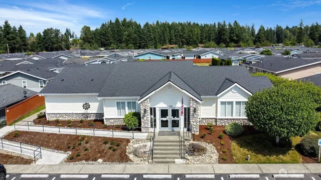 an aerial view of a house with a garden
