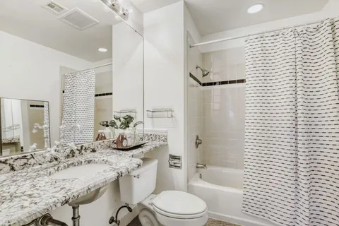 a room with gym equipment and a window