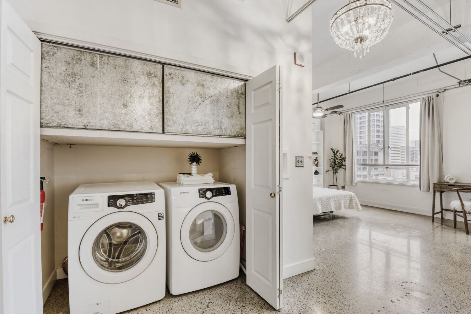 710 Colorado Street, Unit 4G Austin, TX 78701 - Photo 20 of 39 a utility room with dryer and washer
