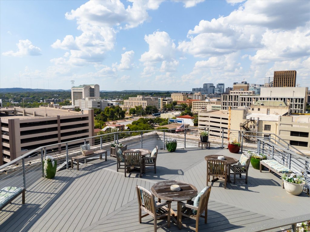710 Colorado Street, Unit 4G Austin, TX 78701 - Photo 22 of 39 Take the party up to the roof top deck to take in the incredible violet crown sunsets and toast some beverages under the stars with the city lights as your backdrop.