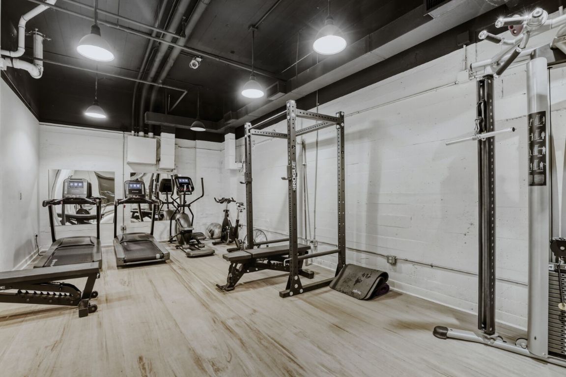 710 Colorado Street, Unit 4G Austin, TX 78701 - Photo 26 of 39 The updated fitness center means you don't need a separate gym membership, you can work out at home!