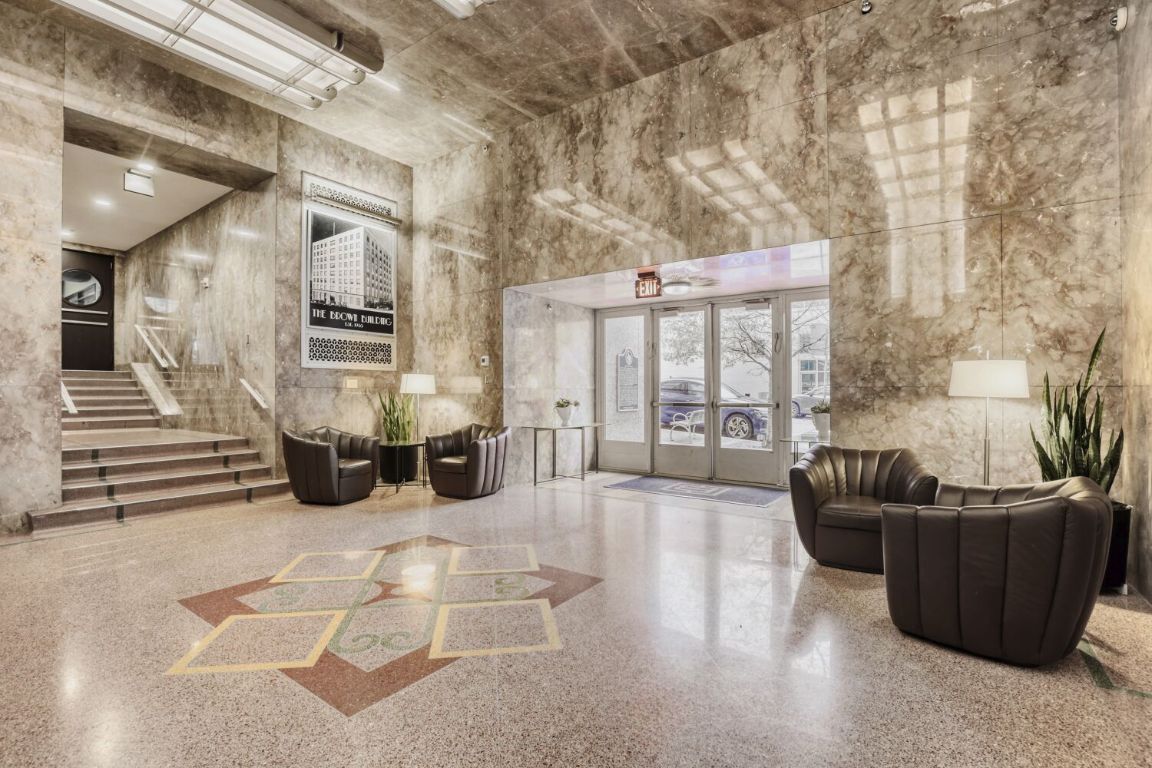 710 Colorado Street, Unit 4G Austin, TX 78701 - Photo 27 of 39 Built starting in 1938, it retains the original exterior, windows, terrazzo floors and impressive lobby all done in Art Moderne style.