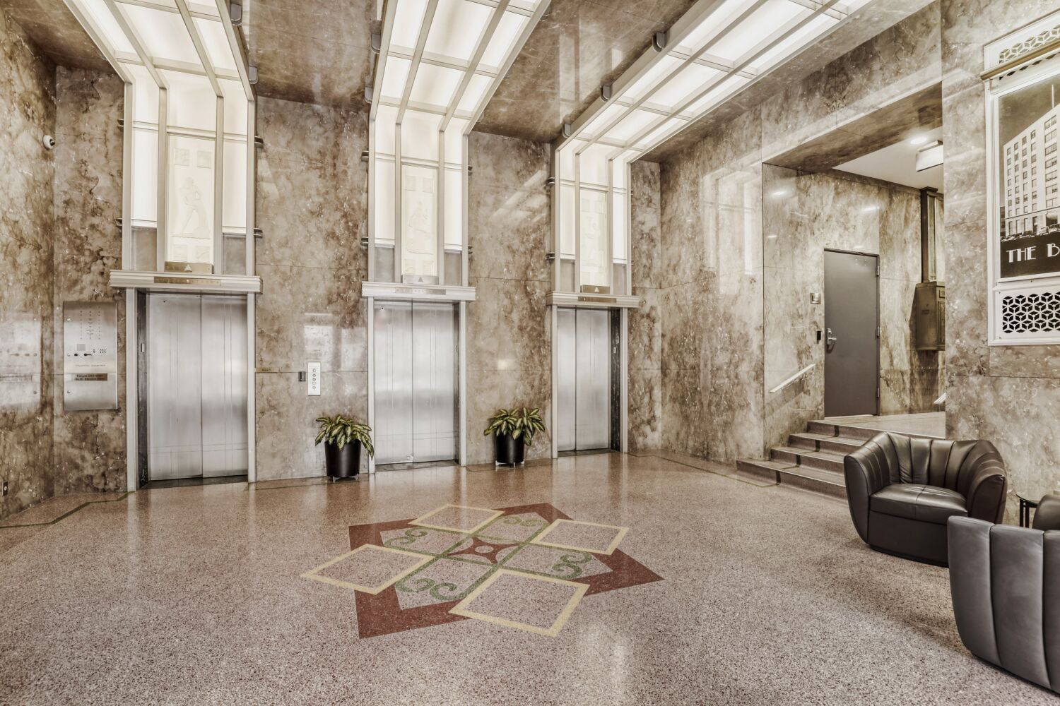 710 Colorado Street, Unit 4G Austin, TX 78701 - Photo 28 of 39 a lobby with furniture and a glass door