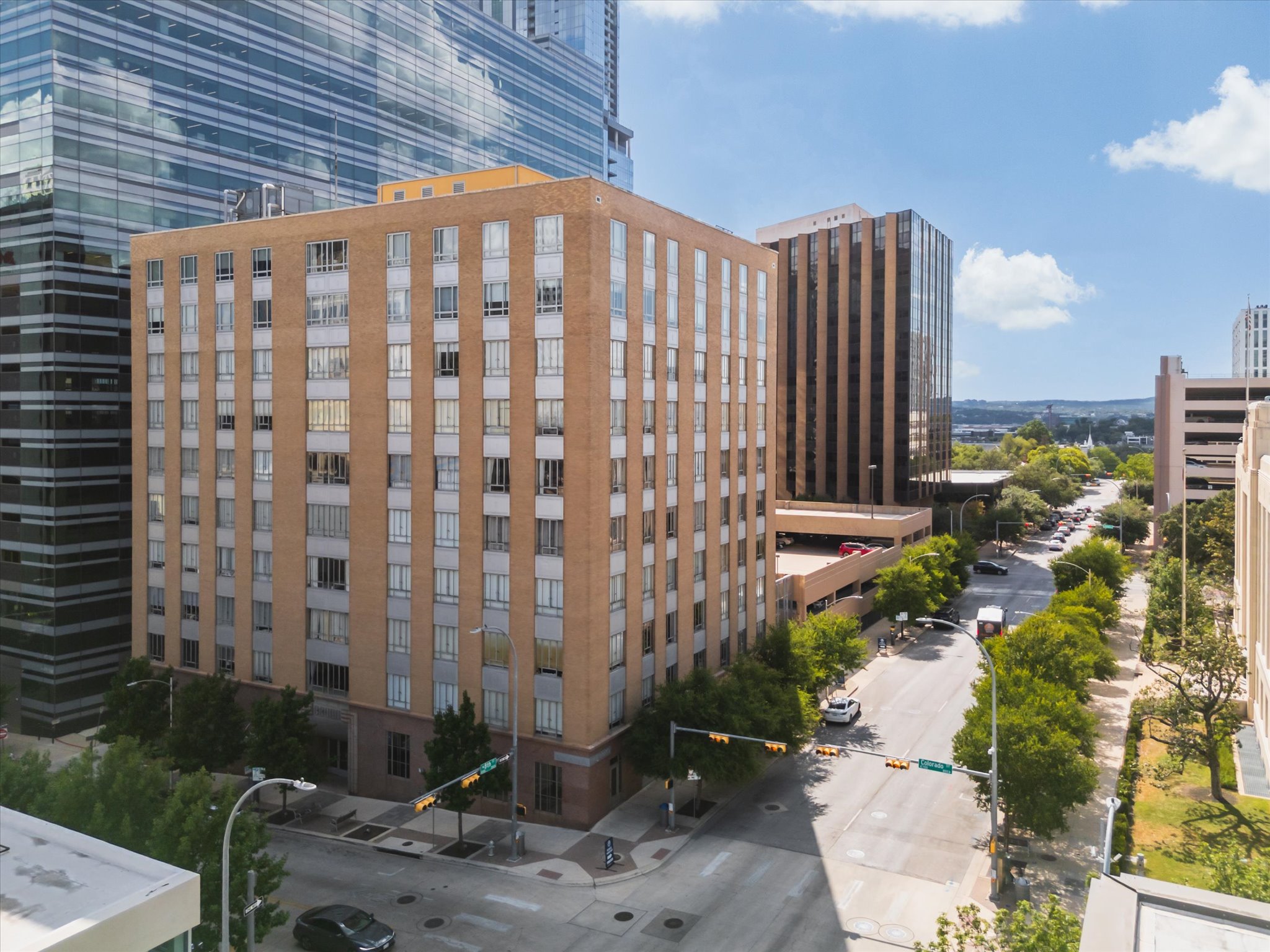 710 Colorado Street, Unit 4G Austin, TX 78701 - Photo 33 of 39 a street view with tall buildings