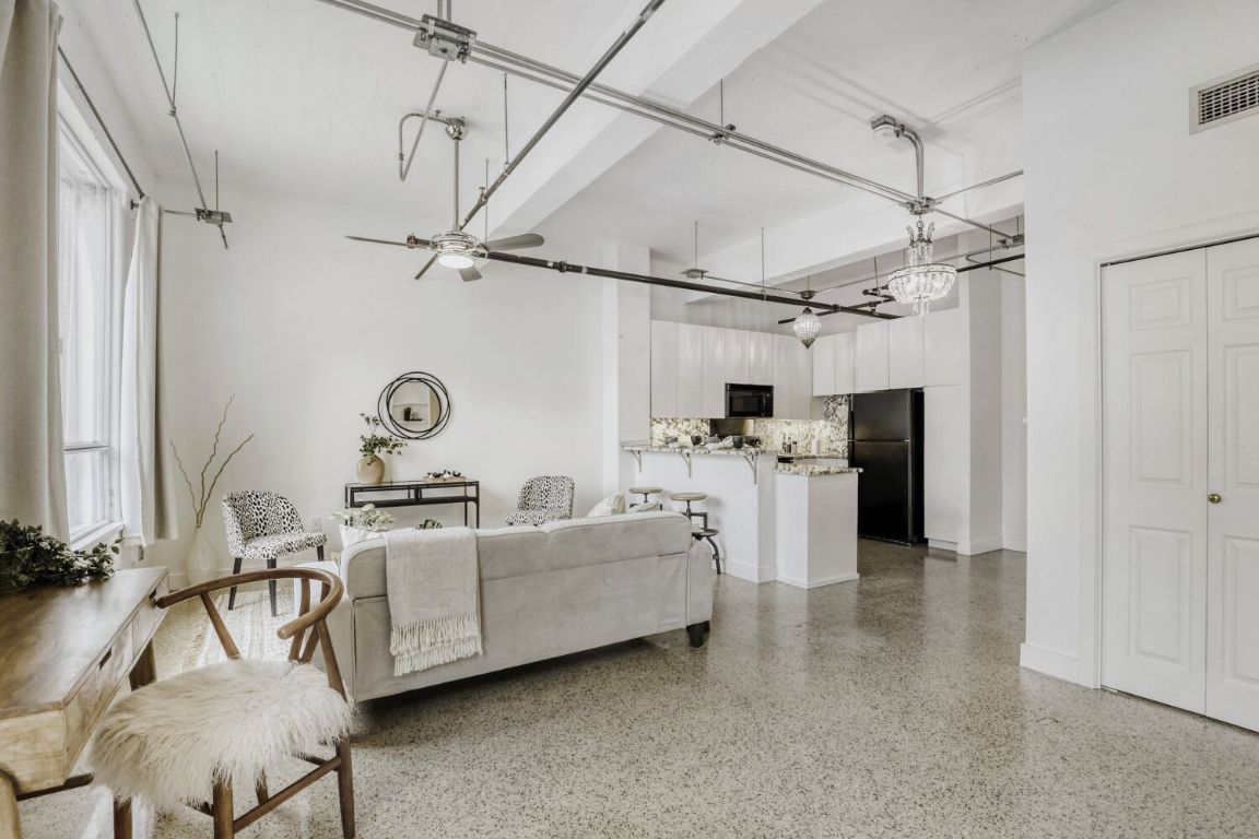 710 Colorado Street, Unit 4G Austin, TX 78701 - Photo 37 of 39 The open floor plan makes it easy to stay connected throughout the condo.