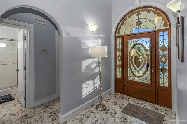 a view of an entryway with a door