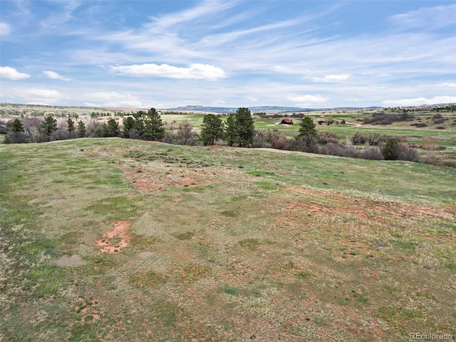 4771 Jackson Creek Road Sedalia, CO 80135 - Photo 13 of 19 a view of an outdoor space and a yard
